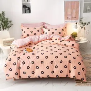 Parure de lit rose fleurie, bonne qualité et à la mode, très confortable dans une maison