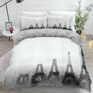 Parure de lit Paris blanche, bonne qualité et très confortable sur un lit dans une maison.