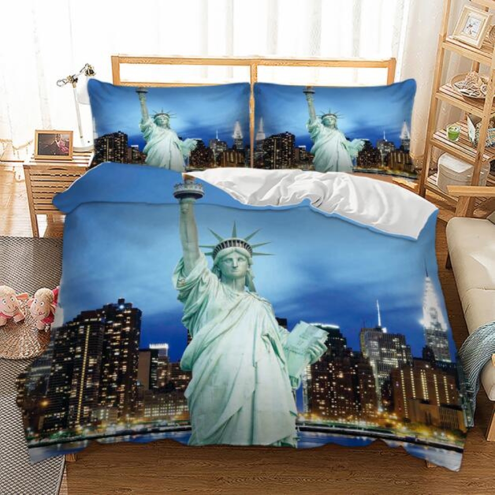 Parure de lit Statue de la Liberté. Bonne qualité, confortable et à la mode sur un lit dans une maison,