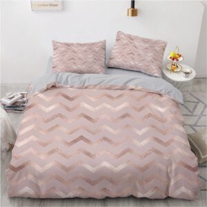 Parure de lit rose et grise vague. Bonne qualité, confortable et à la mode sur un lit dans une maison