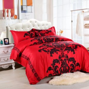 Parure de lit rouge imprimé baroque noir. Bonne qualité, confortable et à la mode sur un lit dans une maison