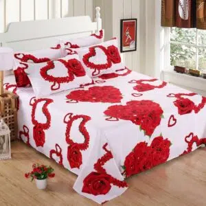 Parure de lit blanche cœur rouge. Bonne qualité, confortable et à la mode sur un lit dans une maison