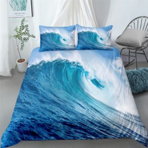 Parure de lit vague d'océan. Bonne qualité, confortable et à la mode sur un lit dans une maison