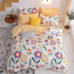 Parure de lit fleurs colorées, bonne qualité et à la mode sur un lit dans une maison
