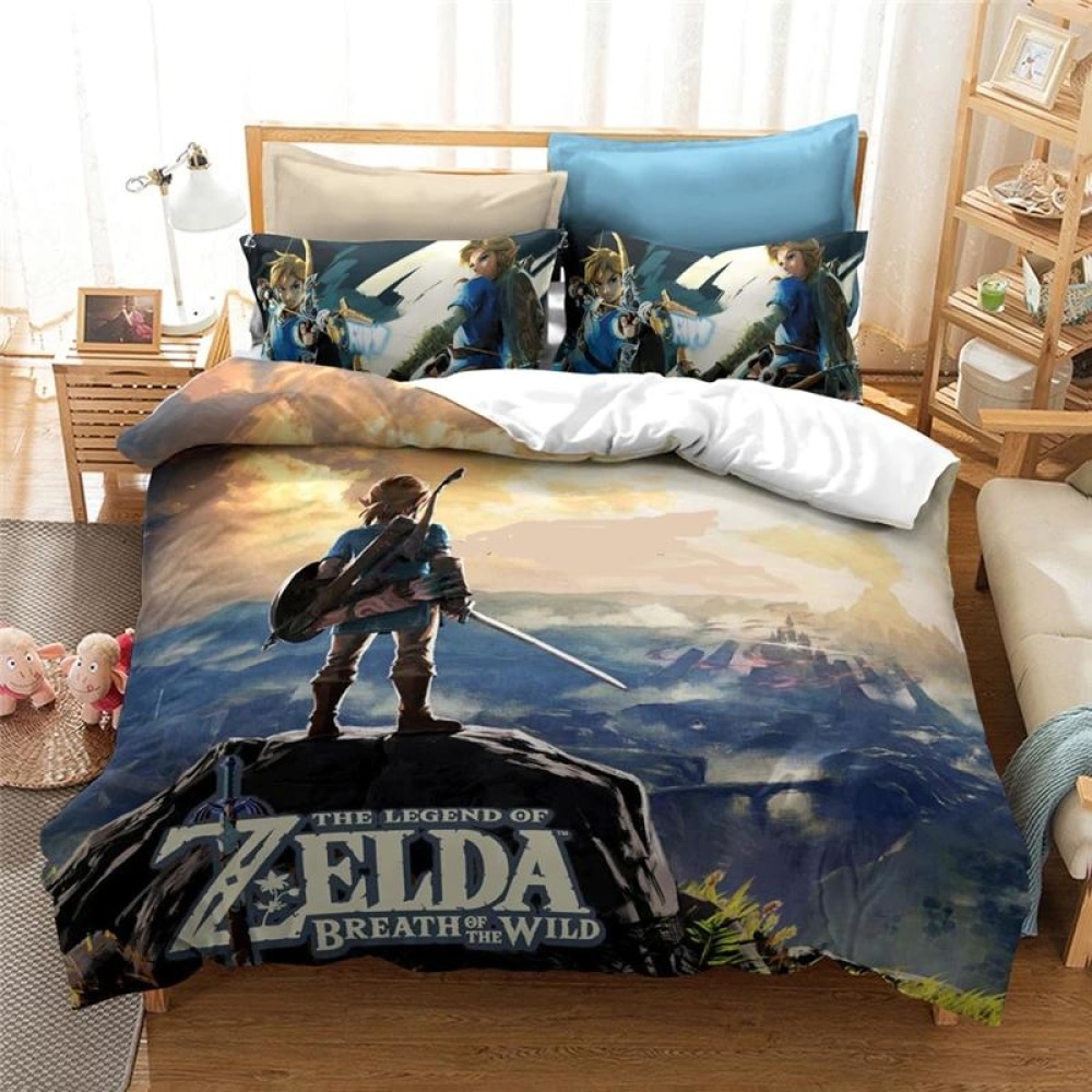 Parure avec une image de Link de Zelda sur une montagne avec un paysage devant lui. Il est représenté de dos avec son épée et son bouclier.La parure comporte deux oreillés avec un design différent de Link en mode guerrier.