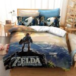 Parure avec une image de Link de Zelda sur une montagne avec un paysage devant lui. Il est représenté de dos avec son épée et son bouclier.La parure comporte deux oreillés avec un design différent de Link en mode guerrier.