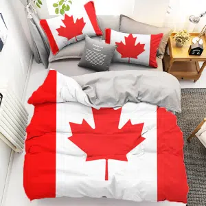 Parure de lit drapeau canadien. Bonne qualité, confortable et à la mode sur un lit dans une maison