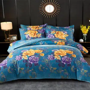 Parure de lit fleurie bleue jaune et violet. Bonne qualité, confortable et à la mode sur un lit dans une maison