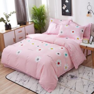 Parure de lit rose en coton imprimé fleurs. Bonne qualité, confortable et à la mode sur un lit dans une maison