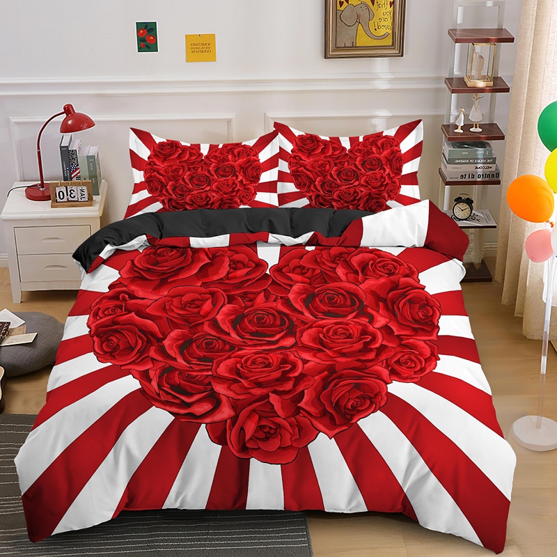 Parure de lit rouge et blanc à motif roses en forme de cœur. Bonne qualité, confortable et à la mode sur un lit dans une maison