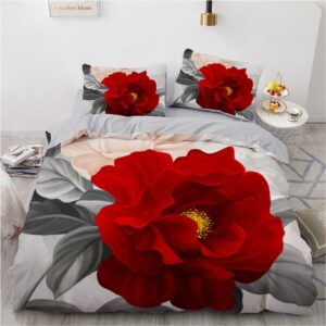 Parure de lit grise avec imprimé rose rouge. Bonne qualité, confortable et à la mode sur un lit dans une maison