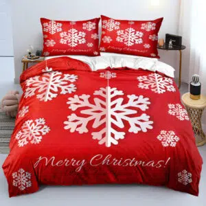 Parure de lit de Noël motif "Joyeux Noël" confortable. Bonne qualité, confortable et à la mode sur un lit dans une maison