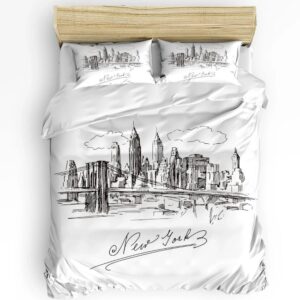 Parure de lit New York noire et blanche effet dessin avec "New York" écrit en dessous. Sur un lit double avec deux coussins assortis. La tête de lit est en bois beige. Sur fond blanc.