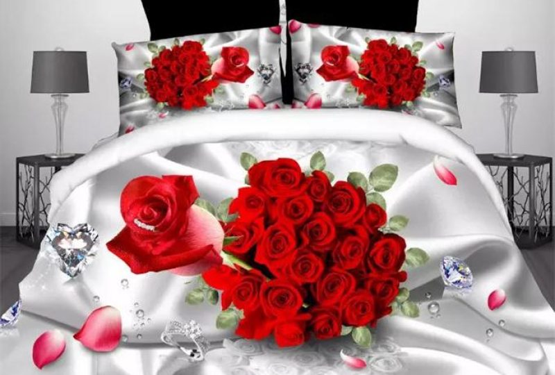 Parure de lit blanche rose rouge. Bonne qualité, confortable et à la mode sur un lit dans une maison