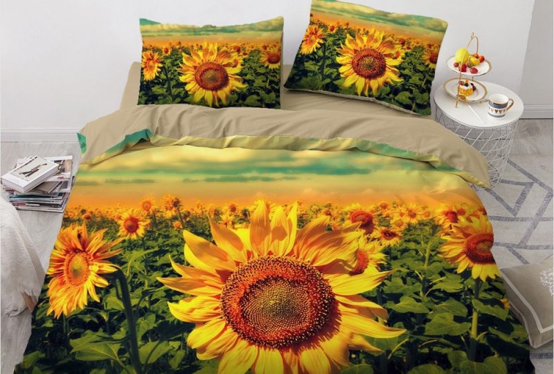56330-cb3ad4.jpg Parure de lit à motif tournesol. Bonne qualité, confortable et à la mode sur un lit dans une maison