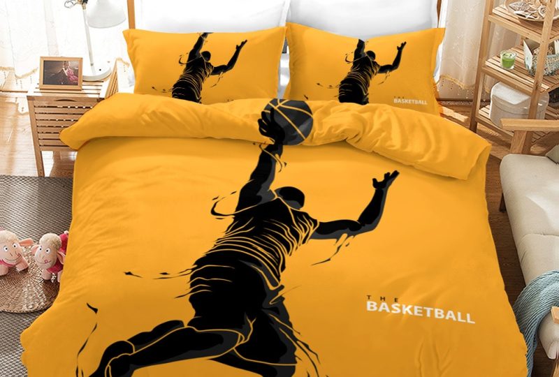 Parure de lit sport basketball orange. Bonne qualité, confortable et à la mode sur un lit dans une maison