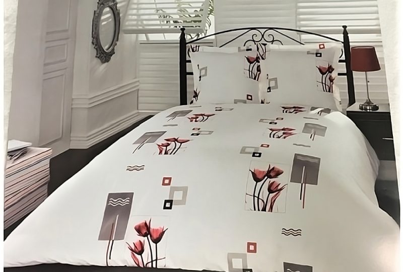 Parure de lit blanche réversible avec un fond une chambre